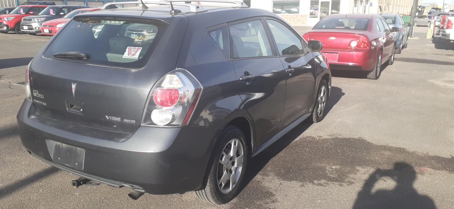 2010 Pontiac Vibe AWD (5Y2SM6E01AZ) with an 2.4L L4 DOHC 16V engine, 4-Speed Automatic transmission, located at 2015 Cambell Street, Rapid City, SD, 57701, (605) 342-8326, 44.066433, -103.191772 - CARFAX AVAILABLE - Photo#4